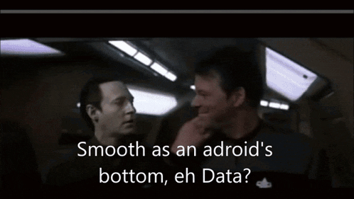 two men are having a conversation and the words smooth as an adroid 's bottom eh data