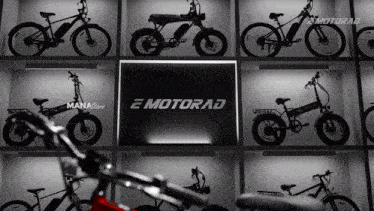 a display of e motorrad bikes on a wall