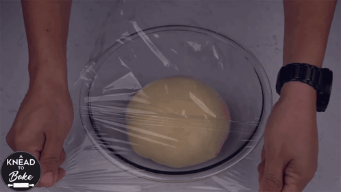 Covering The Dough With Plastic Wrap A Knead To Bake GIF - Covering The Dough With Plastic Wrap A Knead To Bake Let This Dough Rest For A While GIFs