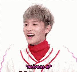 a young man wearing a baseball jersey and a red turtleneck is smiling and says `` nervous af '' .