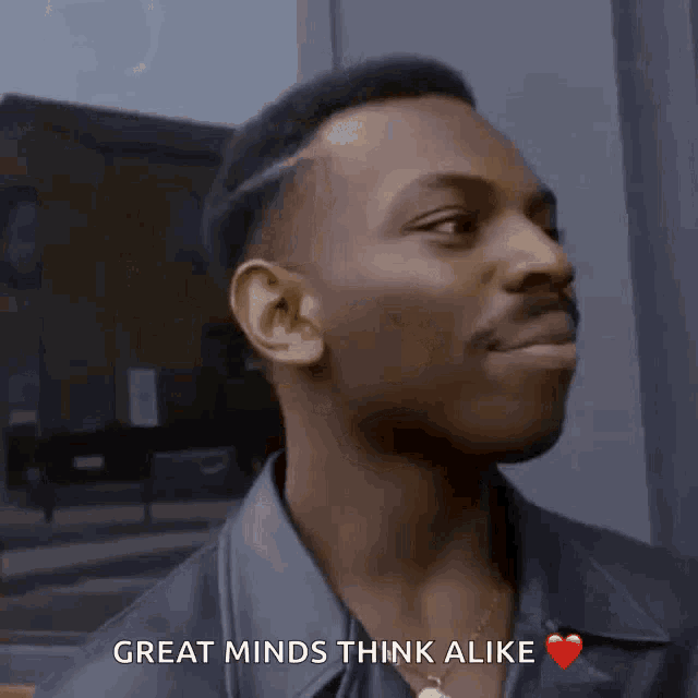 a man says great minds think alike and has a heart on his chest
