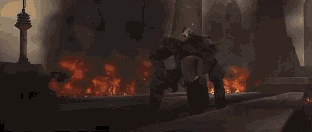 a man with a beard is holding a light saber in front of a fire