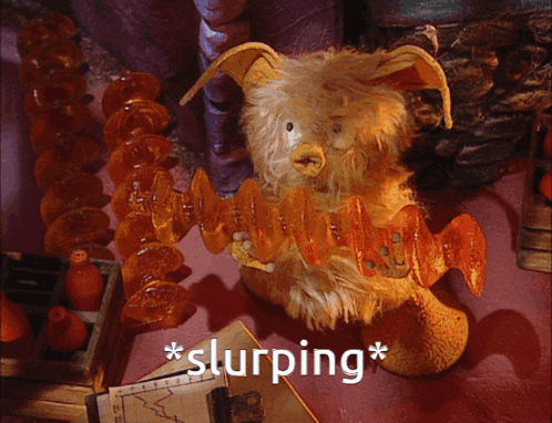 a stuffed animal with the word slurping written on it