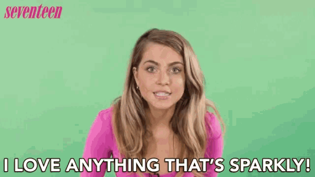 a woman is saying `` i love anything that 's sparkly '' .