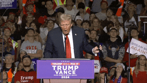 donald trump is giving a speech at a trump vance rally