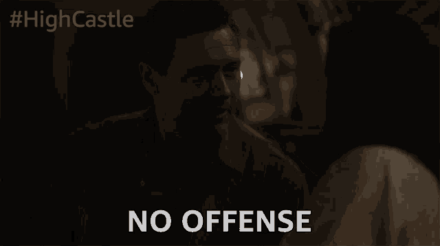 a man says " no offense " in a dark room