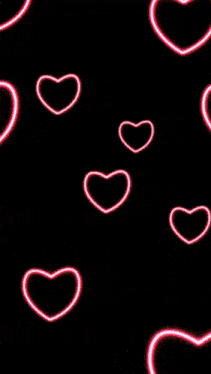 a man and a woman are surrounded by neon hearts with the letter h in the background