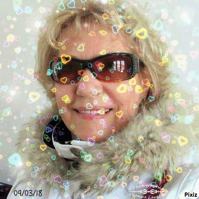 a woman wearing sunglasses and a fur coat is surrounded by colorful hearts and the date 04/03/18