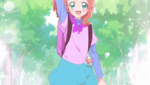 a cartoon girl with red hair and green eyes