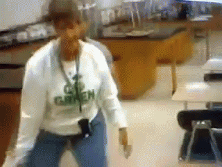 a woman wearing a white shirt that says go green on it