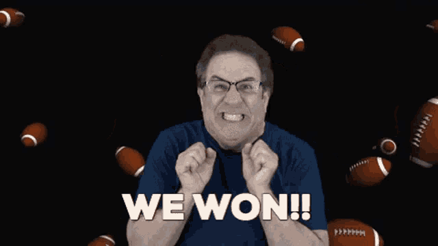 a man in a blue shirt is celebrating with footballs flying around him and the words we won !