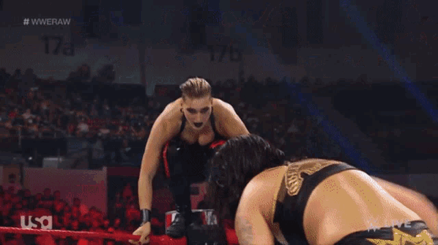 a wrestler in a wrestling ring with the hashtag #wweraw on the screen