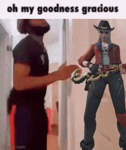a man and a woman are standing next to each other in a hallway holding a snake .