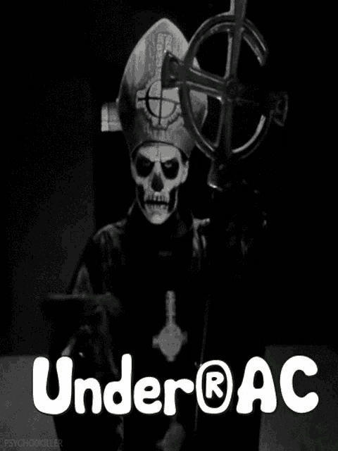 a black and white photo of a man with a skull face and the words under ac