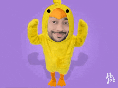 a man with a beard is dressed in a yellow chicken costume