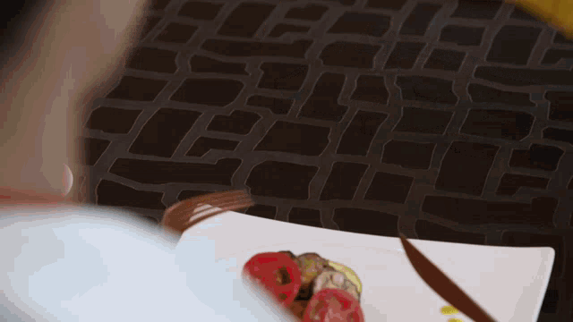 a plate of food with a fork and knife on it
