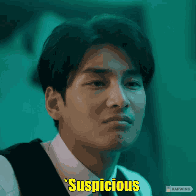 a close up of a man 's face with the word suspicious in yellow