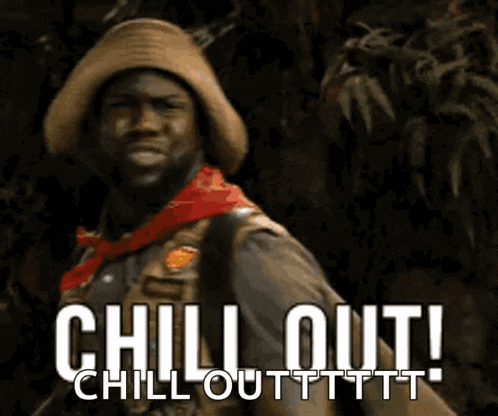a man with a cowboy hat and a red scarf says chill out