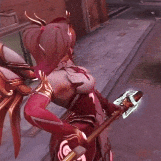 a woman in a red and gold costume is holding a sword