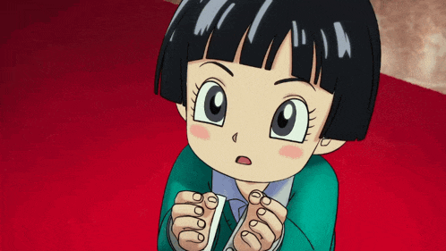 a cartoon girl with short black hair and a green sweater