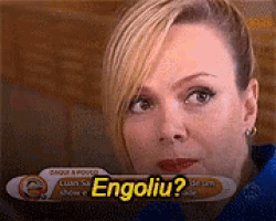 a close up of a woman 's face with the words engoliu on the bottom right