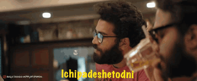 a man with glasses and a beard says ichipadeshetodni in yellow letters