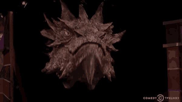 a picture of a dragon with the words comedy central on the bottom