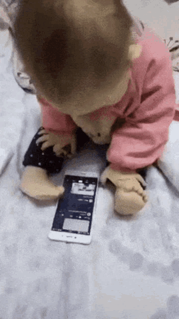 Baby Scrolls Phone Phone GIF - Baby Scrolls Phone Phone Baby GIFs