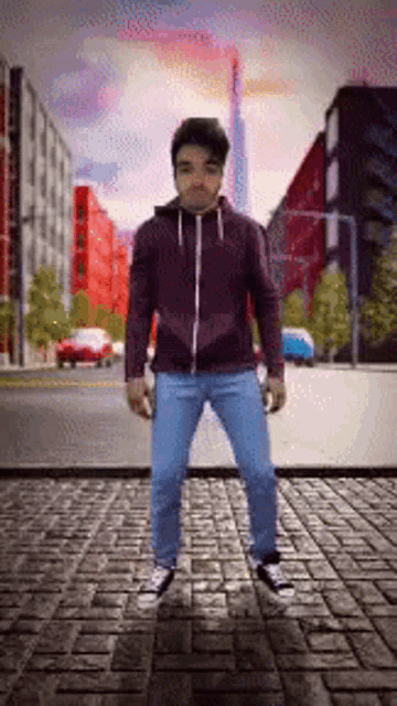 a man in a purple jacket and blue jeans is standing on a brick street