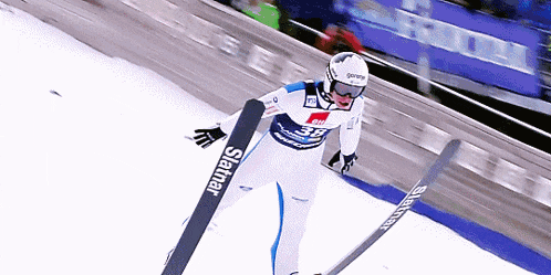 a skier with the number 38 on his pants