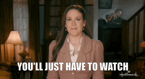 a woman says " you 'll just have to watch " in a hallmark ad