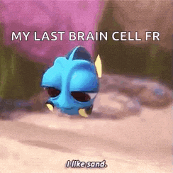 dory from the movie finding dory is laying in the sand .