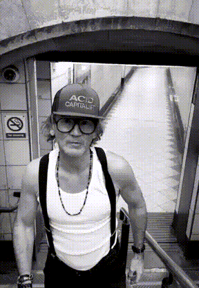 a man wearing a cap that says ac capitals