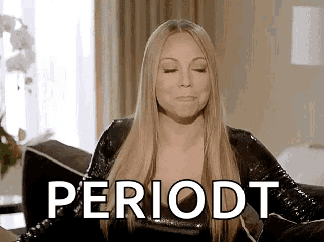 a woman is sitting on a couch with her eyes closed and the word periodt written in front of her .
