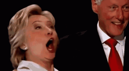 hillary clinton is making a funny face while standing next to bill clinton .