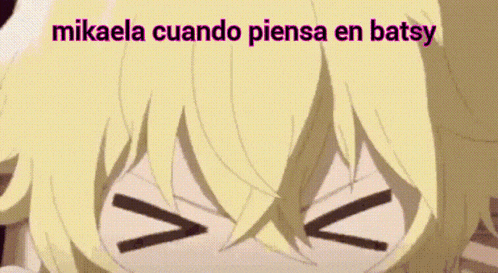 a close up of a girl 's face with the words mikaela cuando piensa en batsy written above it