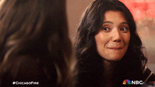 a close up of a woman 's face with #chicagofire written below her