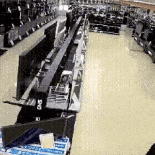 a row of shelves in an electronics store with a sign that says ' ctvs ' on it