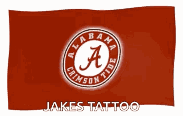 an alabama crimson tide logo on a red flag
