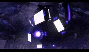 a purple and white robot with a white screen on top