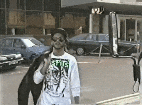 a man wearing a white shirt that says misfits