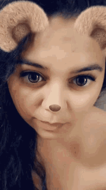 a close up of a woman 's face with a fake nose