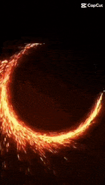 a circle of fire with sparks coming out of it