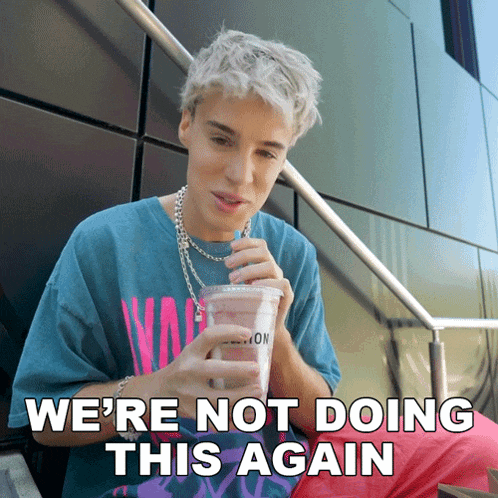 a young man drinking from a cup with the words " we 're not doing this again " above him