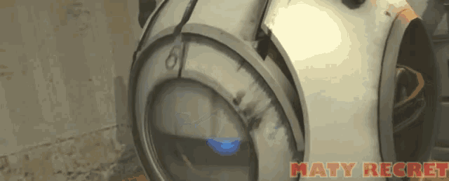 a picture of a gray object with the words maty regret on the bottom