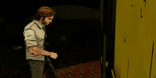 a man in a white shirt and tie is standing in front of a yellow door