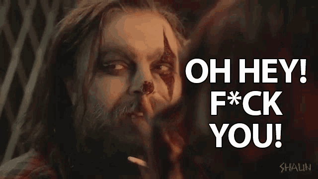 a man with a beard has a clown face painted on his face and says oh hey f * ck you .