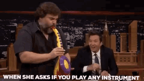 a man playing a toy saxophone with the words when she asks if you play any instrument