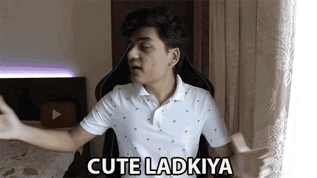 a man in a white shirt says cute ladkiya