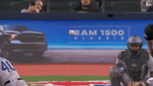 a baseball player with the number 40 on the back of his jersey